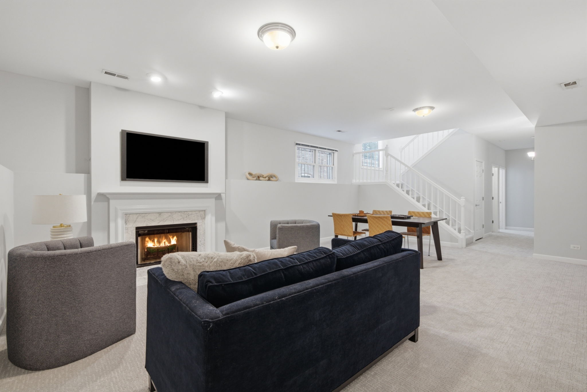 Rec room wide view with stairs